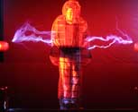 An SG30 Twin Tesla coil with a sarcophagus Faraday Cage high voltage special effect