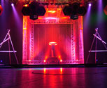 An SG75 Tesla coil inside a Faraday Cage for car launch